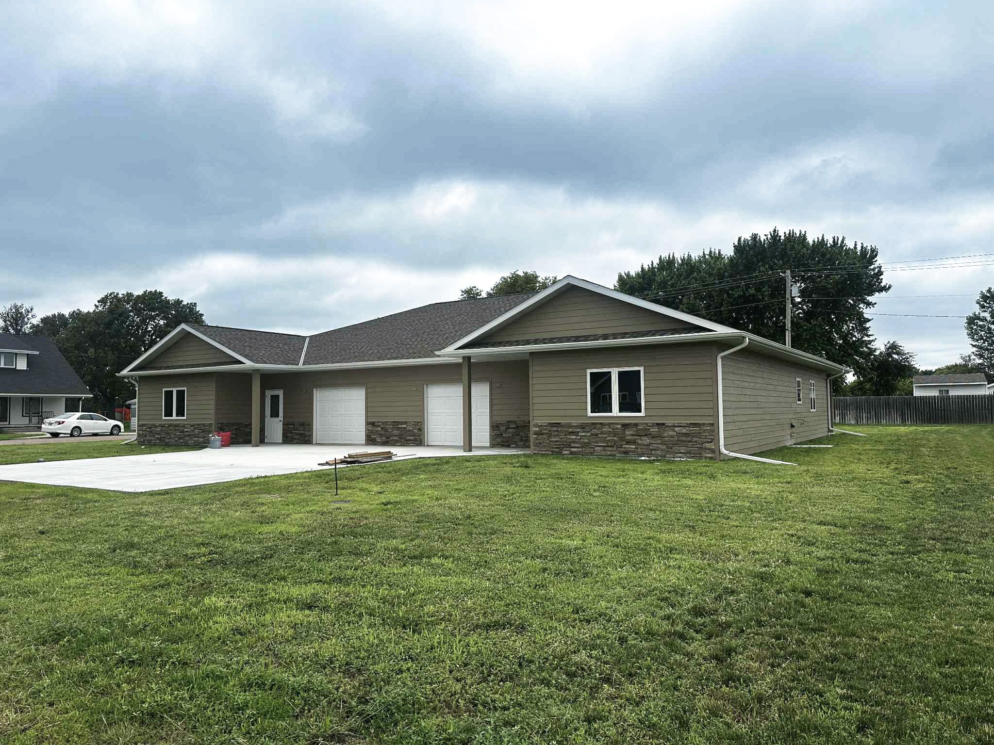 306 walnut street townhouse for sale in arnold nebraska listed by agri affiliates broken bow office with real estate agents Brad Atkins Faith Correll and Bonnie Downing