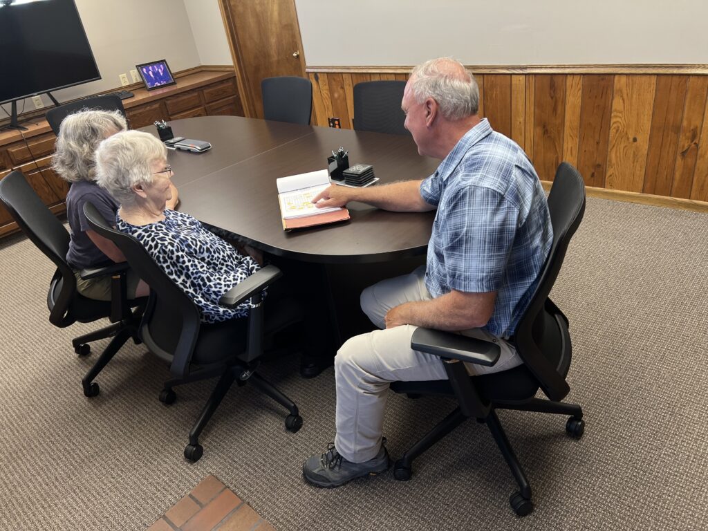 bart woodward certified general appraiser with clients talking through an appraisal that was done on a farm estate through agri affiliates kearney nebraska